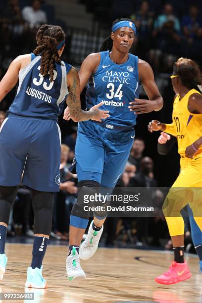 Seimone Augustus of the Minnesota Lynx high-fives Sylvia Fowles of the Minnesota Lynx during the game against the Los Angeles Sparks on July 5, 2018...