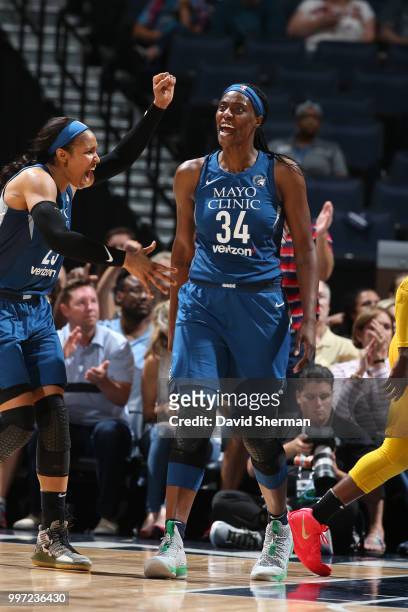 Maya Moore of the Minnesota Lynx and Sylvia Fowles of the Minnesota Lynx react during the game against the Los Angeles Sparks on July 5, 2018 at...