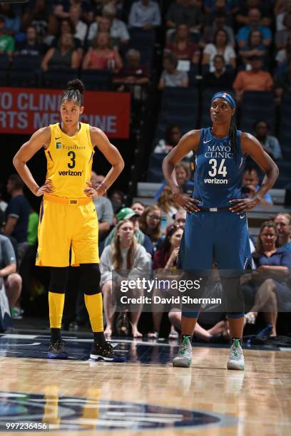 Candace Parker of the Los Angeles Sparks and Sylvia Fowles of the Minnesota Lynx look on during the game between the two teams on July 5, 2018 at...