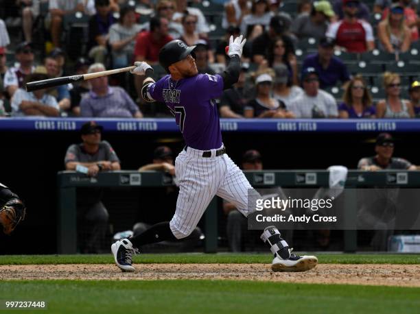 Colorado Rockies shortstop Trevor Story hits a solo home run against the Arizona Diamondbacks in the 7th inning at Coors Field July 12, 2018. Rockies...