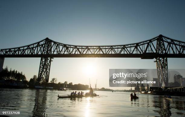 The German eight under the Rendsburger Hochbruecke bridge on the Kiel Canal after the race in Rendsburg, Germany, 15 October 2017. Photo: Daniel...