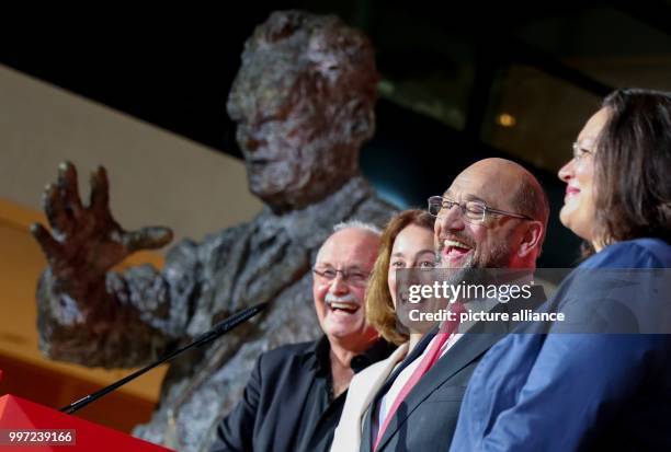 Dpatop - SPD party leader Martin Schulz speaking after the first projection at Willy-Brandt-Haus in Berlin, Germany, 15 October 2017. Beside him are...
