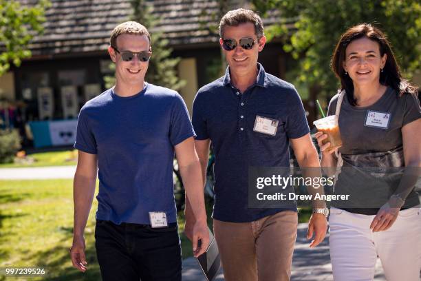 Mark Zuckerberg, chief executive officer of Facebook, Dan Rose, vice president, partnerships at Facebook, and Sheryl Sandberg, chief operating...