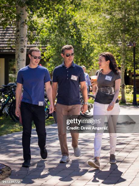 Mark Zuckerberg, chief executive officer of Facebook, Dan Rose, vice president, partnerships at Facebook, and Sheryl Sandberg, chief operating...