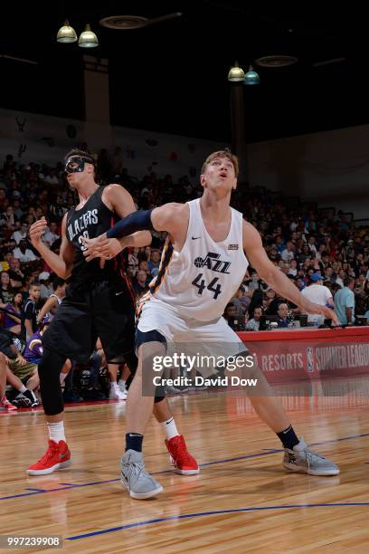 Isaac Haas of the Utah Jazz boxes out Zach Collins of the Portland Trail Blazers during the 2018 Las Vegas Summer League on July 7, 2018 at the Cox...