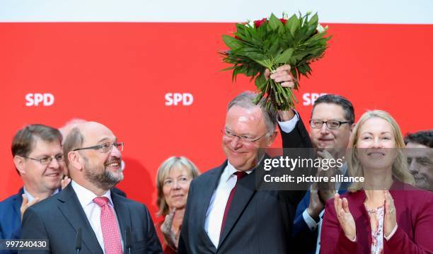 The head of the SPD Martin Schulz with the premier of the state of Lower Saxony Stephan Weil and other senior party members in Berlin, Germany, 16...