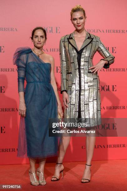 Adriana Herrera and Karlie Kloss attend Vogue 30th Anniversary Party at Casa Velazquez on July 12, 2018 in Madrid, Spain.