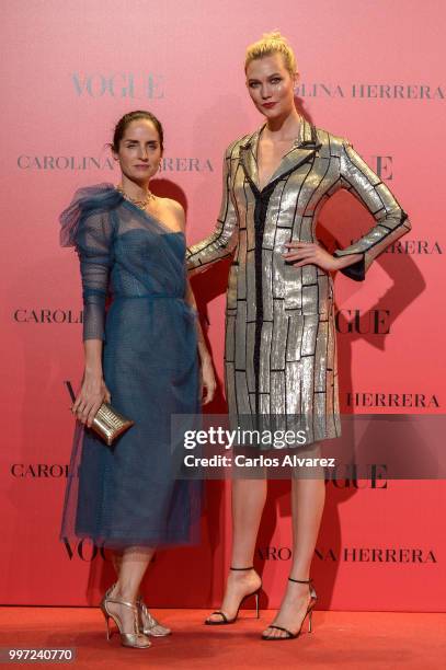 Adriana Herrera and Karlie Kloss attend Vogue 30th Anniversary Party at Casa Velazquez on July 12, 2018 in Madrid, Spain.