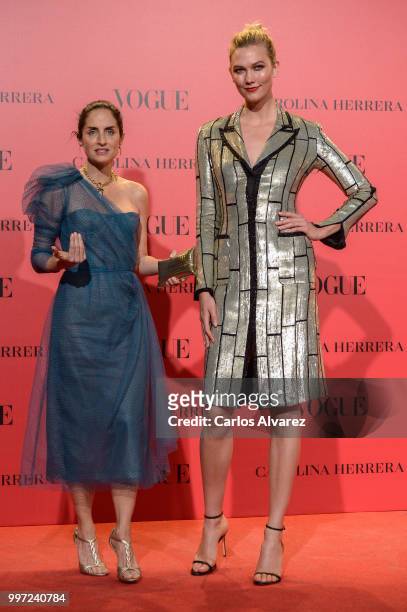 Adriana Herrera and Karlie Kloss attend Vogue 30th Anniversary Party at Casa Velazquez on July 12, 2018 in Madrid, Spain.