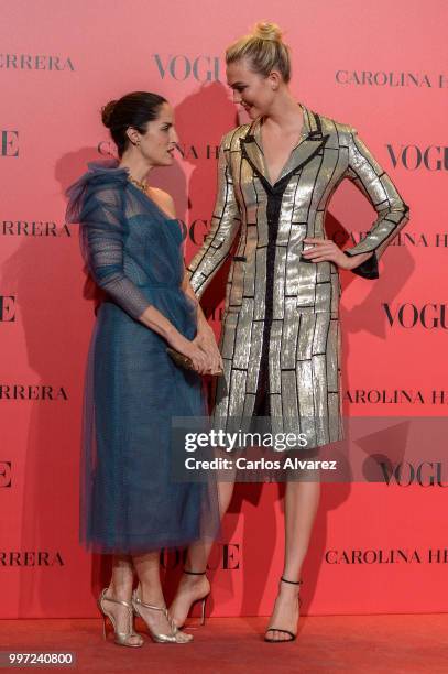 Adriana Herrera and Karlie Kloss attend Vogue 30th Anniversary Party at Casa Velazquez on July 12, 2018 in Madrid, Spain.