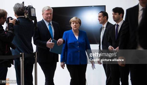 German chancellor and CDU leader Angela Merkel and the party's top candidate in yesterday's election in the state of Lower Saxony, Bernd Althusmann,...