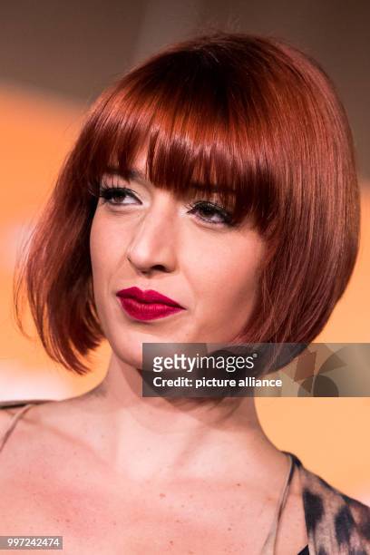 Model shows off the latest hairstyling trends at the Haare 2017 trade show in Nuremberg, Germany, 16 October 2017. Photo: Daniel Karmann/dpa