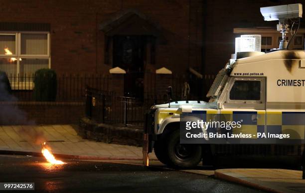 The scene on Fahan street in Londonderry after a petrol bomb was thrown at a police vehicle on the same day an Orange Order parade made it's way...