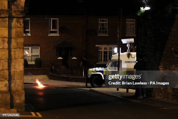 The scene on Fahan street in Londonderry after a petrol bomb was thrown at a police vehicle on the same day an Orange Order parade made it's way...