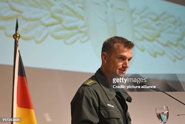 The commander of the GSG 9, Jerome Fuchs, speaks ons tage during the ceremony of the elite Police Tactical Unit GSG 9 of the German Federal Police on...
