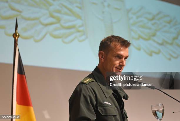 The commander of the GSG 9, Jerome Fuchs, speaks on stage during the ceremony of the elite Police Tactical Unit GSG 9 of the German Federal Police on...