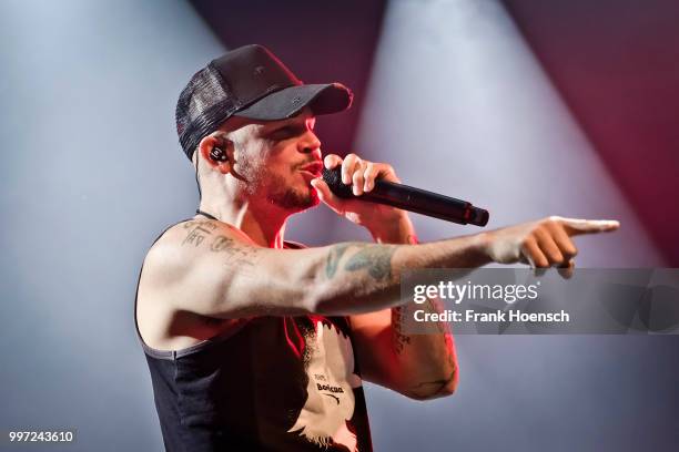 Puerto Rican rapper Rene Perez Joglar aka Residente performs live on stage during a concert at the Columbiahalle on July 12, 2018 in Berlin, Germany.