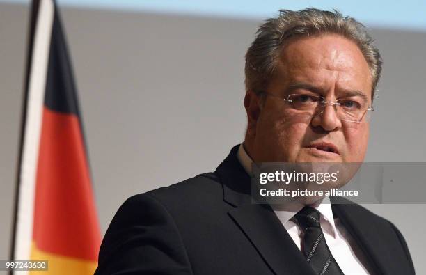 The president of the police headquarters, Dieter Romann, speaks during the ceremony of the elite Police Tactical Unit GSG 9 of the German Federal...