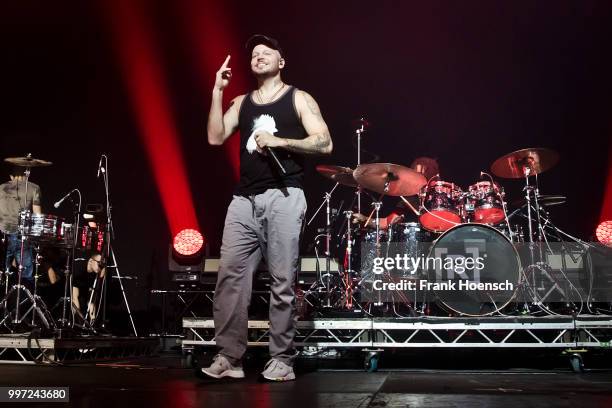 Puerto Rican rapper Rene Perez Joglar aka Residente performs live on stage during a concert at the Columbiahalle on July 12, 2018 in Berlin, Germany.