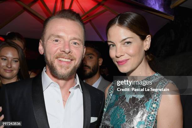 Simon Pegg and Michelle Monaghan attend the cast reception following the global premiere of 'Mission: Impossible - Fallout' at Cafe de l'Homme on...