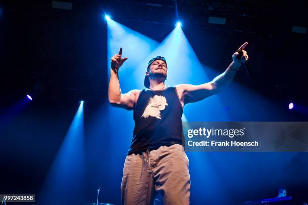 Puerto Rican rapper Rene Perez Joglar aka Residente performs live on stage during a concert at the Columbiahalle on July 12, 2018 in Berlin, Germany.