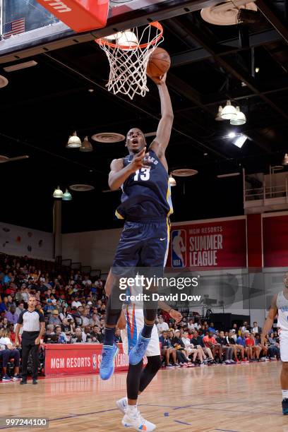 Jaren Jackson Jr. #13 of the Memphis Grizzlies dunks the ball against the Oklahoma City Thunder during the 2018 Las Vegas Summer League on July 12,...