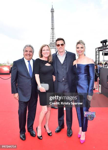 Paramount Chairman and CEO Jim Gianopulos, guest, David Ellison and Sandra Lynn Modic attend the Global Premiere of 'Mission: Impossible - Fallout'...