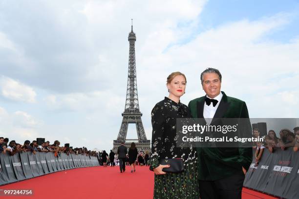 Composer Lorne Balfe and guest attend the Global Premiere of 'Mission: Impossible - Fallout' at Palais de Chaillot on July 12, 2018 in Paris, France.