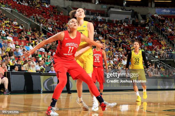 Elena Delle Donne of the Washington Mystics boxes out Breanna Stewart of the Seattle Storm during the game on July 8, 2018 at Key Arena in Seattle,...