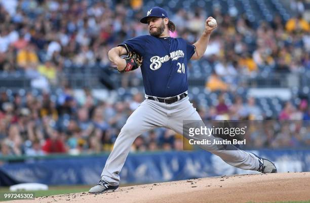 Wade Miley of the Milwaukee Brewers delivers a pitch in the first inning during the game against the Pittsburgh Pirates at PNC Park on July 12, 2018...