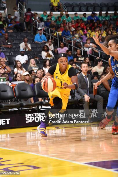 Odyssey Sims of the Los Angeles Sparks handles the ball against the Dallas Wings on July 12, 2018 at STAPLES Center in Los Angeles, California. NOTE...
