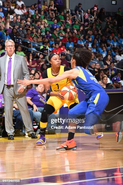 Odyssey Sims of the Los Angeles Sparks handles the ball against the Dallas Wings on July 12, 2018 at STAPLES Center in Los Angeles, California. NOTE...