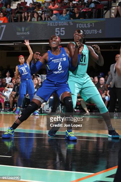Kayla Thornton of the Dallas Wings boxes out Tina Charles of the New York Liberty on July 8, 2018 at Westchester County Center in White Plains, New...