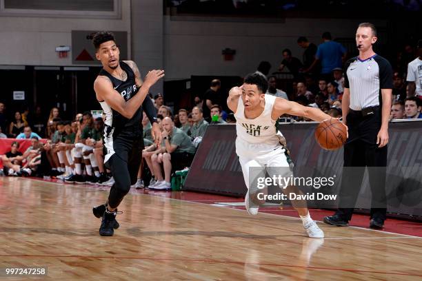 Travis Trice II of the Milwaukee Bucks handles the ball against the San Antonio Spurs during the 2018 Las Vegas Summer League on July 12, 2018 at the...