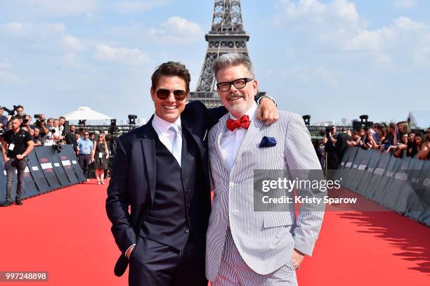 Tom Cruise and Director Christopher McQuarrie attend the Global Premiere of 'Mission: Impossible - Fallout' at Palais de Chaillot on July 12, 2018 in...