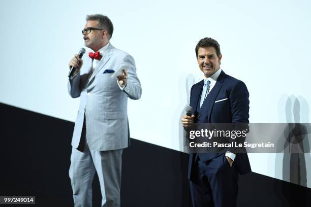 Tom Cruise and Director Christopher McQuarrie attend the Global Premiere of 'Mission: Impossible - Fallout' at Palais de Chaillot on July 12, 2018 in...