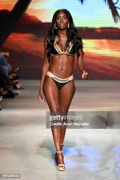 Model walks the runway for Just Bones Boardwear at Miami Swim Week powered by Art Hearts Fashion Swim/Resort 2018/19 at Faena Forum on July 12, 2018...
