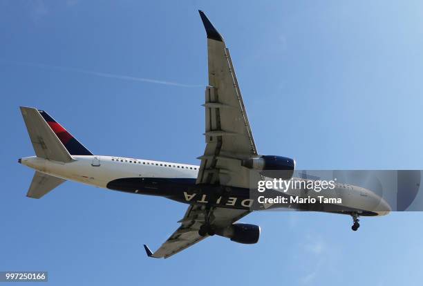 Delta Air Lines plane lands at Los Angeles International Airport on July 12, 2018 in Los Angeles, California. Delta announced today that it will...