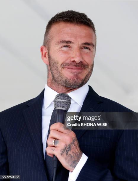 David Beckham addresses fans at a rally in support of building a Major League Soccer stadium on public land in Miami, Florida on July 12, 2018. -...