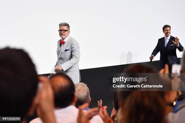 Tom Cruise and Director Christopher McQuarrie attend the Global Premiere of 'Mission: Impossible - Fallout' at Palais de Chaillot on July 12, 2018 in...