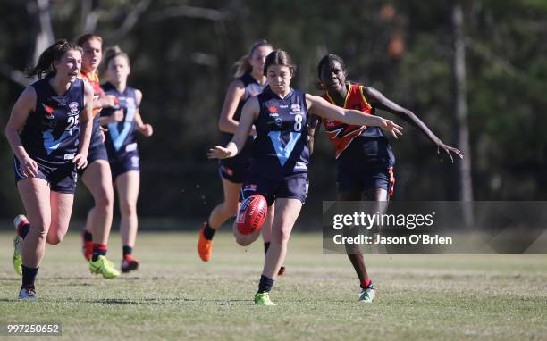 Vic Metro's Georgia Patrikios runs with the ball during the AFLW U18 Championships match between Vic Metro v Central Allies at Bond University on...