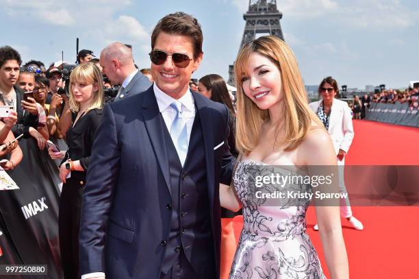 Tom Cruise and Alix Benezech attend the Global Premiere of 'Mission: Impossible - Fallout' at Palais de Chaillot on July 12, 2018 in Paris, France.