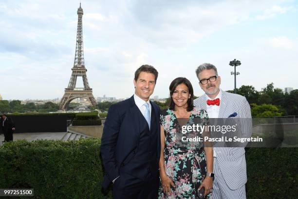 Tom Cruise, Anne Hidalgo and Director Christopher McQuarrie attend the Global Premiere of 'Mission: Impossible - Fallout' at Palais de Chaillot on...
