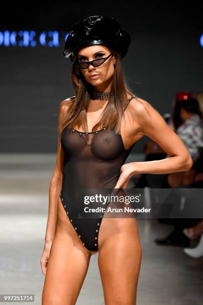 Model walks the runway for Candice Cuoco at Miami Swim Week powered by Art Hearts Fashion Swim/Resort 2018/19 at Faena Forum on July 12, 2018 in...