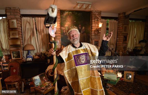 This photo taken on June 6, 2018 shows Paul Delprat gesturing at his home as the self-appointed Prince of the Principality of Wy, a micronation...