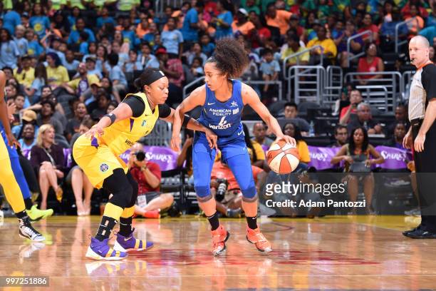 Skylar Diggins-Smith of the Dallas Wings handles the ball against Odyssey Sims of the Los Angeles Sparks on July 12, 2018 at STAPLES Center in Los...