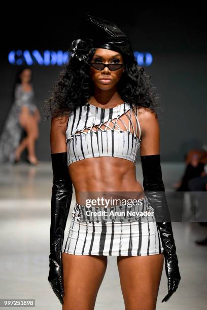 Model walks the runway for Candice Cuoco at Miami Swim Week powered by Art Hearts Fashion Swim/Resort 2018/19 at Faena Forum on July 12, 2018 in...