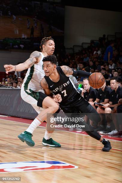 Olivier Hanlan of the San Antonio Spurs handles the ball against the Milwaukee Bucks during the 2018 Las Vegas Summer League on July 12, 2018 at the...