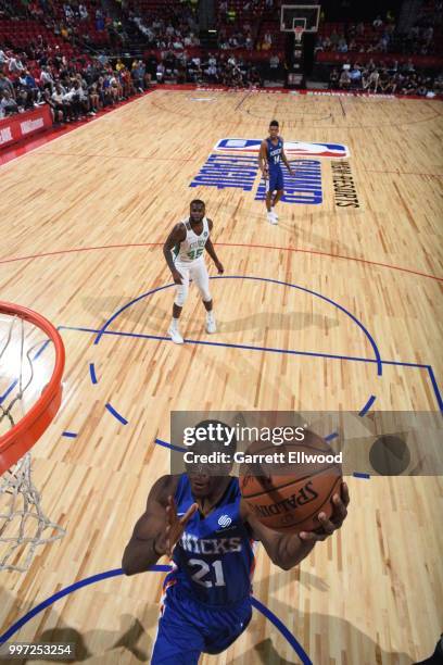 Damyean Dotson of the New York Knicks goes to the basket against the Boston Celtics during the 2018 Las Vegas Summer League on July 12, 2018 at the...