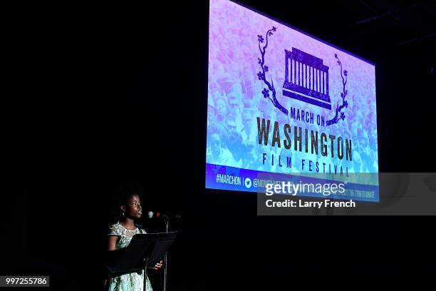 Spoken Word Artist and First National Youth Poet Laureate Amanda Gorman recites poetry during A Tribute to Sonia Sanchez at the opening night of...